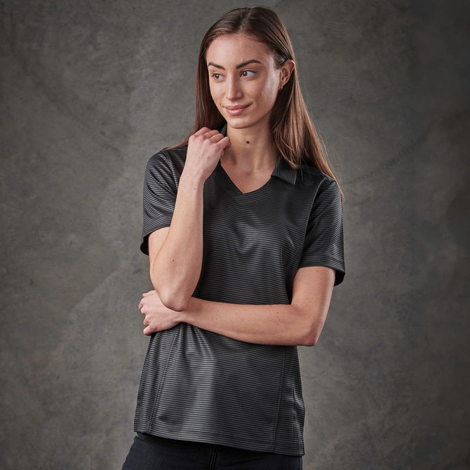 A black women's polo shirt with a subtle texture, featuring a collar and a logo on the chest.