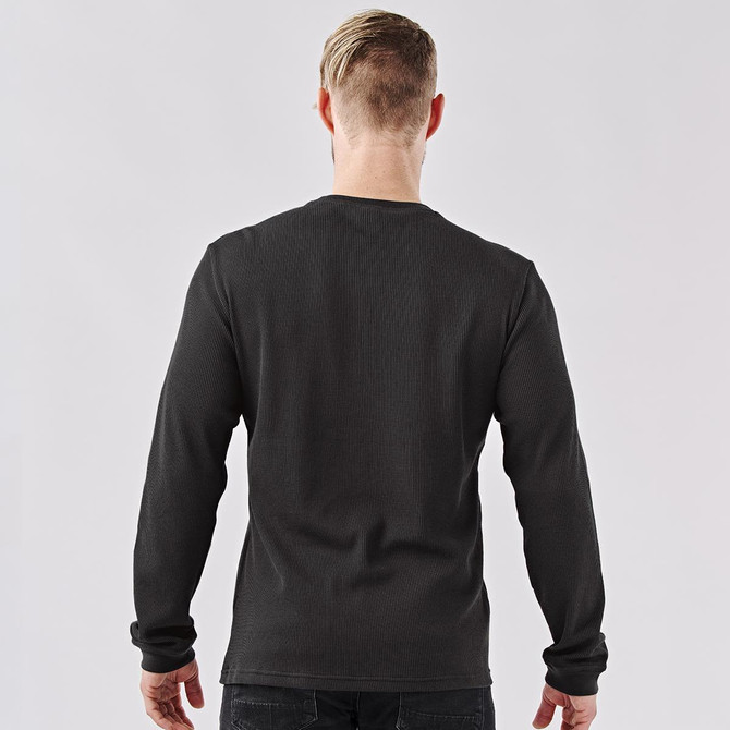 A men's crew neck shirt in ash grey, featuring long sleeves and a simple design, with a logo on the back.