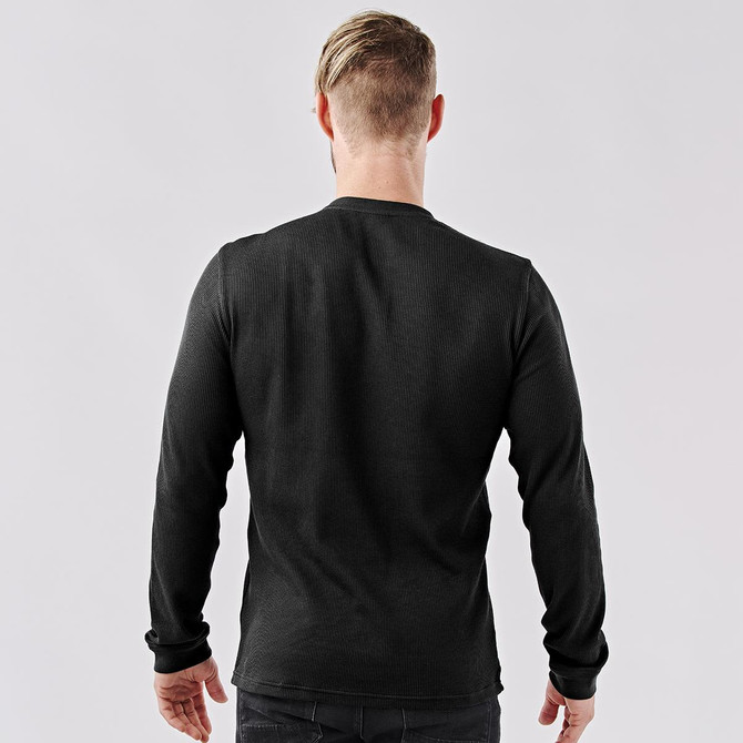 A men's long-sleeve Henley shirt in dark grey, featuring a simple design and fitted silhouette.