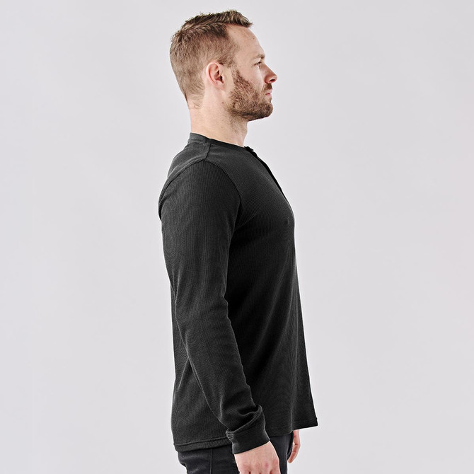 A men's Ashburn Henley shirt in dark grey, featuring a round neckline and long sleeves, with a logo on the chest.