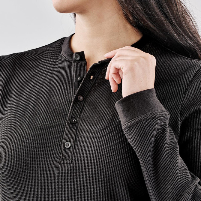 A black women's henley shirt featuring a ribbed texture and button details at the neckline.