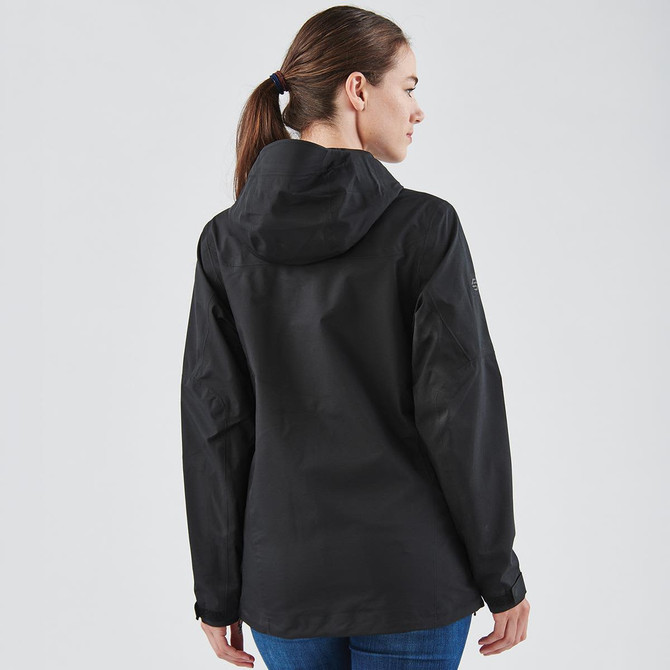 A black women's softshell jacket with a hood, featuring a logo, displayed from the back.