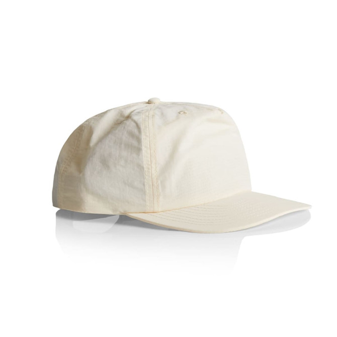 A cream-coloured cap with a curved brim and an adjustable strap at the back. It features a logo.