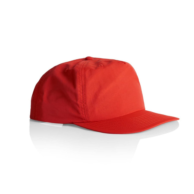 A red cap with a curved brim and a logo, displayed at an angle on a white background.