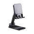 A foldable phone stand in black with an adjustable angle and a sturdy base. It features a smooth surface design.