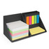 A desk organiser in black with sections for sticky notes and vibrant coloured index flags in pink, yellow, green, and blue.