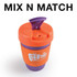 A reusable coffee cup in orange and purple with a silicone band and a cap. It features a logo.
