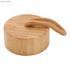 A bamboo drink bottle lid features a textured surface with a braided rope handle. Natural bamboo colour.