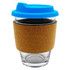 A glass coffee cup with a cork sleeve and a blue plastic lid. It features a logo on the lid.