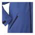 A blue soft shell jacket featuring a zippered pocket and velcro cuffs. The jacket has a textured surface.