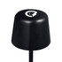 A black mini rechargeable lamp with a rounded top and a logo on the front. The lamp has a slender base.