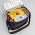 A black insulated bag containing various food and drink items, with a silver lining for temperature control.