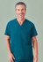 A unisex teal V-neck scrub top with a pocket, worn by a model. The top features a simple design and a logo.