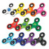 A collection of fidget spinners in various colours, including yellow, green, blue, and red, displayed with black accents.