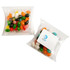 Jelly bean bags in a clear pillow pack, featuring assorted colours including orange, black, white, and green.