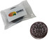A branded packet containing an OREO biscuit, featuring a dark brown cookie with cream filling.