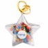 Acrylic star-shaped container filled with colourful M&Ms, featuring a loop for attachment and a brand sticker.