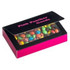 A box with a clear top filled with colourful chocolate-coated candies in pink, green, blue, and yellow hues.
