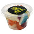 A tub filled with colourful mixed lollies, including various shapes and flavours. The container has a branding label.