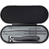 A black manicure set containing a nail clipper and two tools in a sleek, oval case.