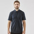 A man wearing a navy blue short sleeve button-up shirt with a pocket and a logo on the chest.