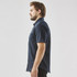 A dark navy short sleeve button-up shirt displayed on a model from the side, featuring a pocket and a logo.