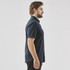 A side view of a navy blue men's short sleeve button-up shirt, featuring a collar and a logo.