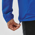 A blue full zip jacket with adjustable drawstring at the hem, featuring long sleeves and a casual fit.