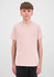 A plain pink short sleeve tee displayed on a model against a neutral background. The shirt has a logo.