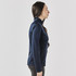 A navy women's pullover with a 1/4 zip, featuring a sleek, fitted design and long sleeves. It has a logo.