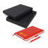 A black gift box contains a red notebook and a silver pen, featuring a logo on the notebook.