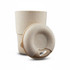 A drink bottle and lid in a speckled off-white colour, featuring a textured grip and a logo.