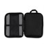 A black zippered pouch with a mesh section and an interior pocket, featuring a handle on the outside.