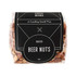 A clear plastic bag containing roasted beer nuts, showcasing a mix of light brown and tan nuts. The bag features a black label with branding.
