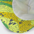 A yellow and green bucket hat featuring playful cartoon-style designs and an inner lining, with a branding patch.