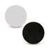 A circular magnetic badge in grey and black, featuring a glossy finish. It has a logo on its surface.