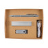 A cardboard gift box containing a silver pen, a power bank, a USB flash drive, and a charging cable.