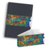 A grey hard cover notebook with a colourful patterned band. The band features a floral design and has a logo.