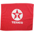A red gym towel featuring a white star logo and the word "TEXACO". Soft and absorbent material ideal for leisure activities.