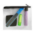 A clear cosmetic bag containing a blue nail file, green lip balm, purple treatment tube, and black compact.