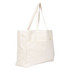 A large beige tote bag with two long straps and a front pocket, featuring a logo.