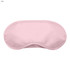A pink sleep eye mask with a smooth surface and contoured shape, featuring a logo.