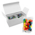 A white gift box containing two clear cubes of colourful jelly beans, alongside a clear pack of assorted jelly beans.