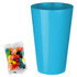 A blue party cup next to a pack of multicoloured jelly beans in assorted shades.