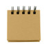 A notepad with a brown cardboard cover and black spiral binding at the top. It has a simplistic design with no text.