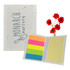 A sticky note pad with a speckled cover featuring a logo, containing colourful sticky notes in pink, orange, green, and yellow.