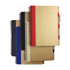 A collection of A5 recycled paper notebooks in various colours including brown, red, black, and blue, with spiral binding.