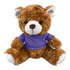 A brown teddy bear plush toy wearing a purple shirt, with soft fur and a friendly expression. It has a logo on the shirt.