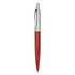 A plastic pen with a red barrel and silver accents, featuring a clip and a ballpoint tip.
