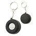A black tyre-shaped key ring with a silver centre, featuring a metal chain and keyring attachment.